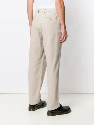Shop Issey Miyake Formal Loose Fit Trousers In Neutrals