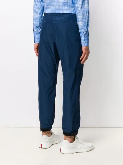 Shop Prada Elasticated Waist Trousers In Blue