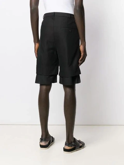 Shop Ann Demeulemeester Layered Hem Shorts In Black