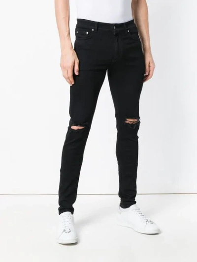 Shop Represent Slash Knee Skinny Jeans - Black