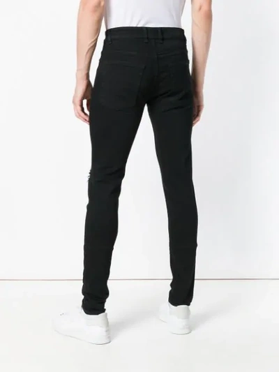 Shop Represent Slash Knee Skinny Jeans - Black