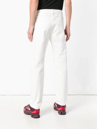 Shop Raf Simons Christiane F. Patch Jeans In White