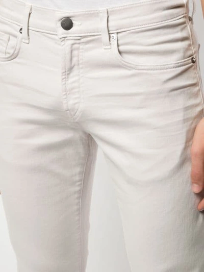 Shop J Brand Kane Slim Fit Trousers In White