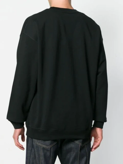 Shop Moschino Printed Logo Sweatshirt In Black
