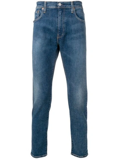 Shop Levi's Slim Tapered Jeans In Blue