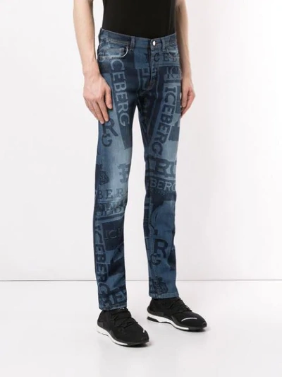 Shop Iceberg Logo Print Jeans In Blue