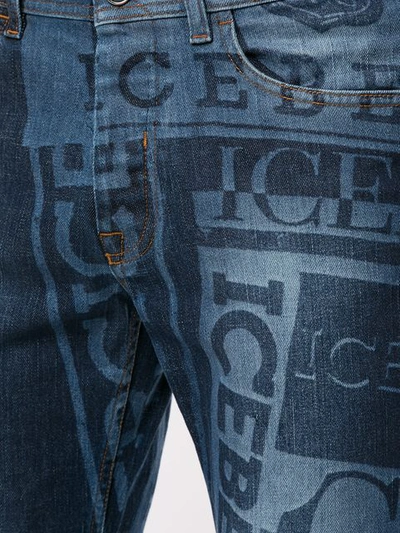 Shop Iceberg Logo Print Jeans In Blue