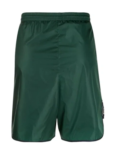 Shop Gucci Logo Stripe Swim Shorts In Green