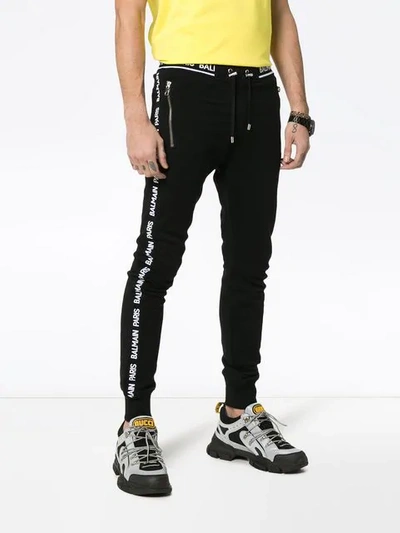 Shop Balmain Logo Stripe Track Trousers In Black