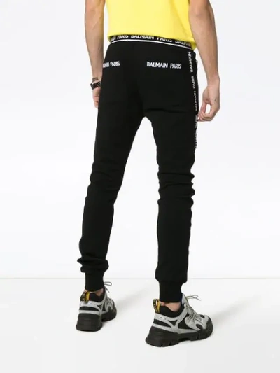 Shop Balmain Logo Stripe Track Trousers In Black