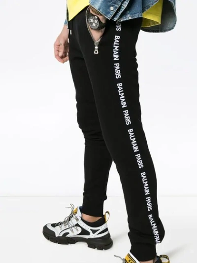 Shop Balmain Logo Stripe Track Trousers In Black