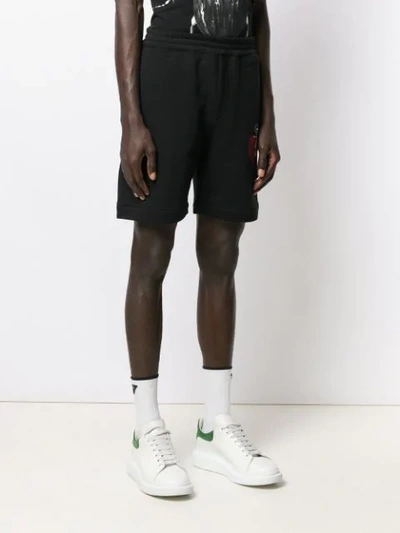 Shop Alexander Mcqueen Skeleton Embroidered Track Shorts In Black
