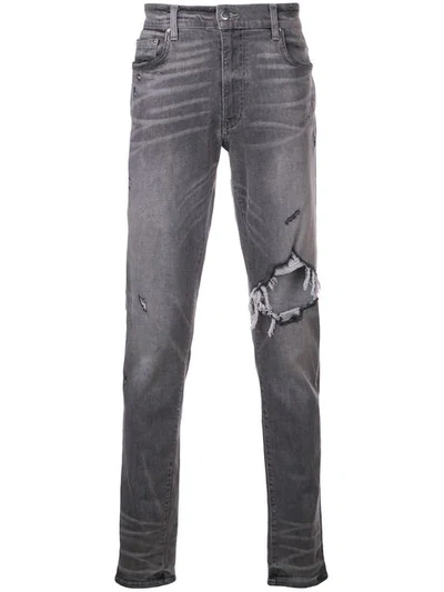 Shop Amiri Distressed Jeans In Grey