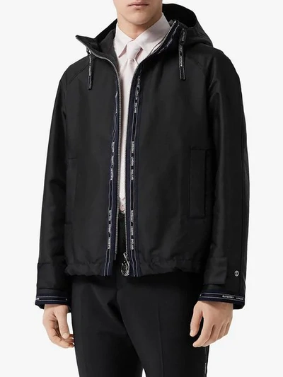 Shop Burberry Logo Detail Nylon Hooded Jacket In Black