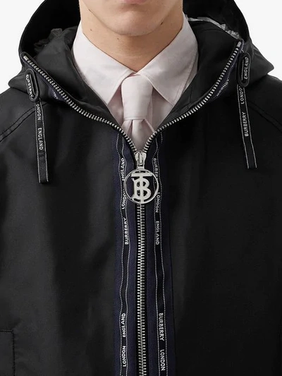 Shop Burberry Logo Detail Nylon Hooded Jacket In Black