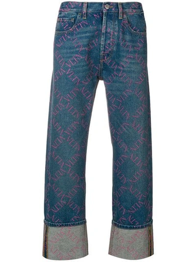 Shop Valentino Vltn Grid Baggy Jeans In Blue
