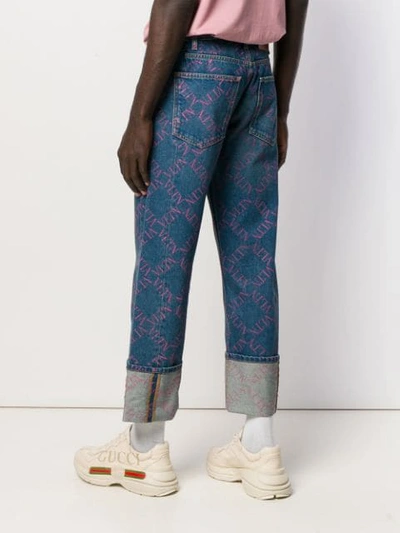 Shop Valentino Vltn Grid Baggy Jeans In Blue