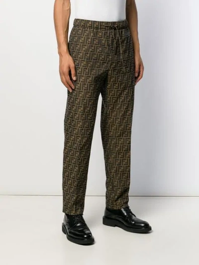Shop Fendi Ff Relaxed-fit Trousers In Brown