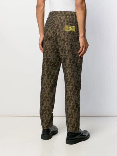 Shop Fendi Ff Relaxed-fit Trousers In Brown