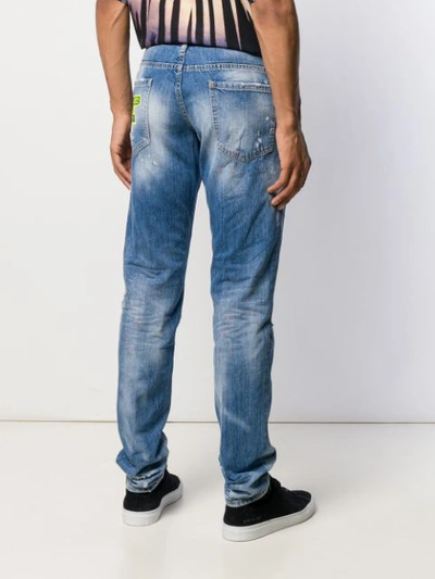 Shop Dsquared2 Distressed Low-rise Jeans In Blue