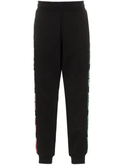 Shop Moschino Ticker Logo Embroidered Cotton Track Pants In Black