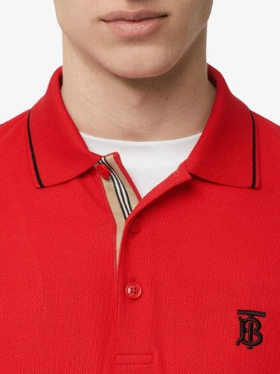 Shop Burberry Icon Stripe Placket Cotton Piqué Polo Shirt In Bright Red