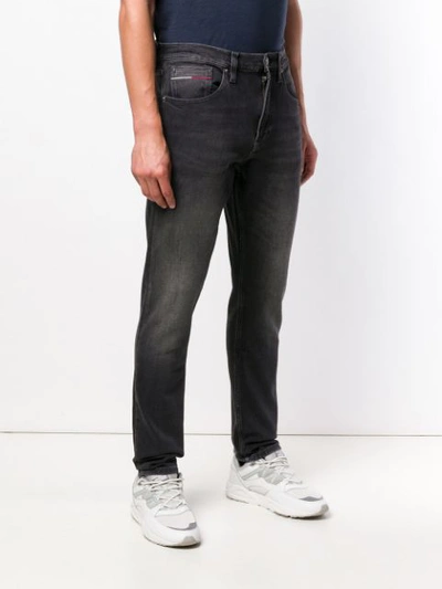 Shop Tommy Hilfiger Slim-fit Jeans - Black