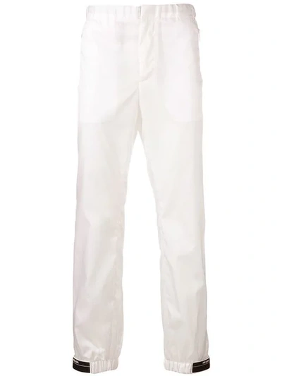 Shop Prada Tapered Elasticated Trousers In White