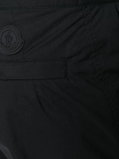 Shop Moncler Waist Strap Trousers In Black