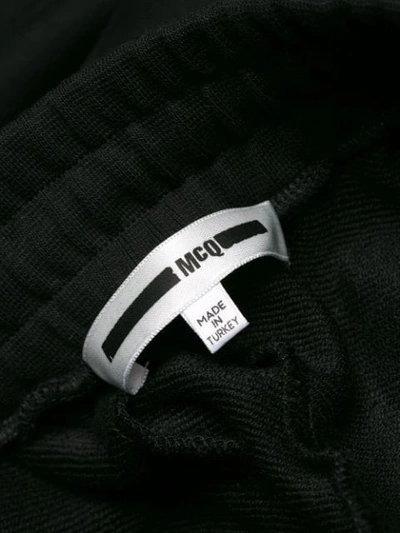 Shop Mcq By Alexander Mcqueen Logo Print Track Pants In Black