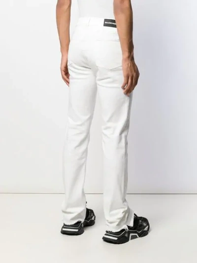 Shop Balenciaga Distressed Straight Fit Jeans In White