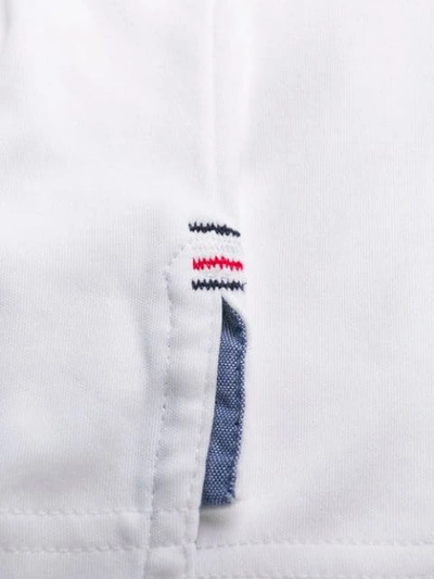 Shop Tommy Hilfiger Logo Polo Shirt In 100 Bright White