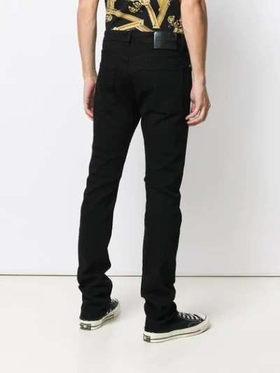 Shop Versace Jeans Straight Leg Jeans In Black