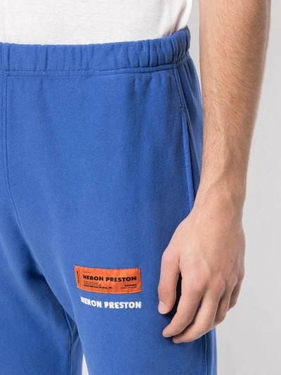 Shop Heron Preston Logo Print Track Pants In Blue
