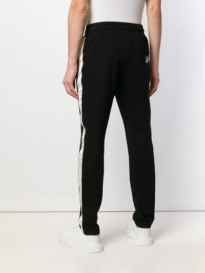 Shop Dolce & Gabbana Track Style Trousers In Black