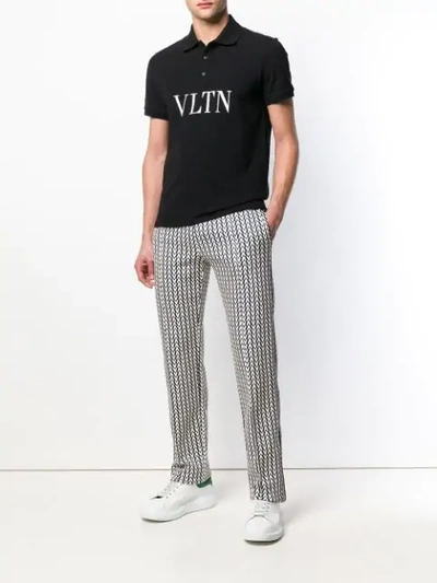 Shop Valentino Optical V Trousers In Blue