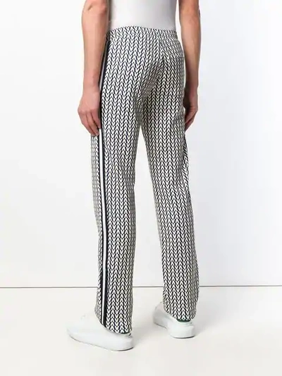 Shop Valentino Optical V Trousers In Blue