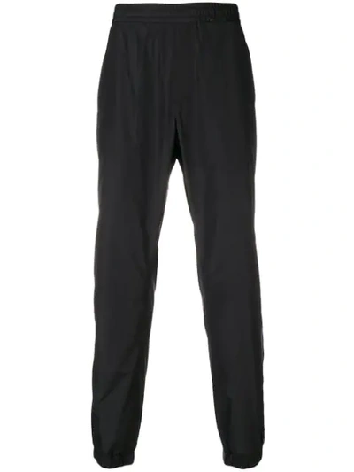 Shop Versace Side-stripe Track Pants In Black