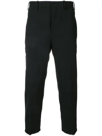 Shop Neil Barrett Frayed Cuffs Cropped Trousers In Black