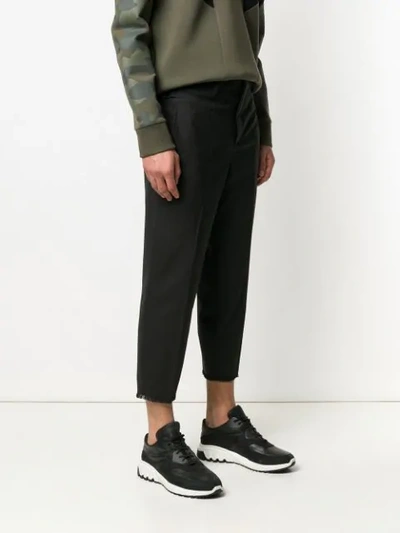 Shop Neil Barrett Frayed Cuffs Cropped Trousers In Black