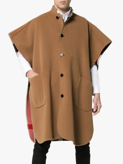 Shop Burberry Reversible Wool Check Poncho In Neutrals