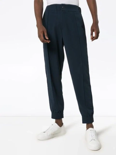 Shop Lot78 Crepe Tape Detail Track Pants In Blue