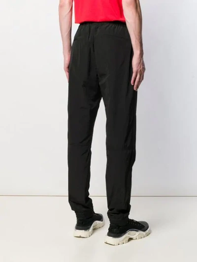 Shop Givenchy Logo Track Pants In Black