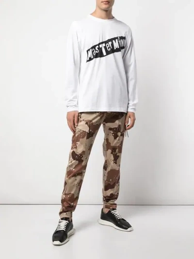 Shop Mastermind Japan Camouflage Print Trousers In Mtc