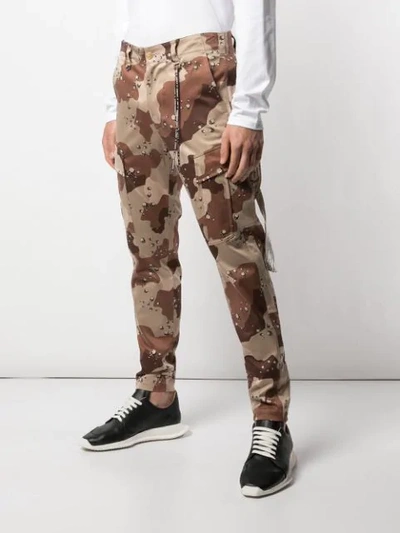 Shop Mastermind Japan Camouflage Print Trousers In Mtc