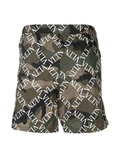 Shop Valentino Vltn Camouflage Swim Shorts In Green