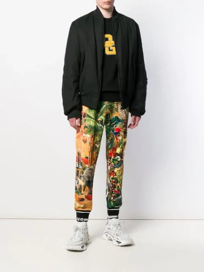 Shop Dolce & Gabbana Printed Track Pants In Yellow