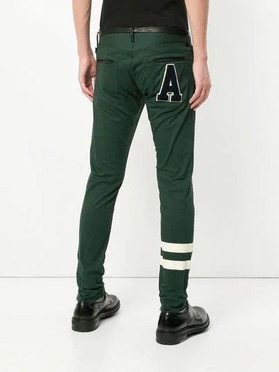 Shop Undercover Skinny Embellished Trousers In Green