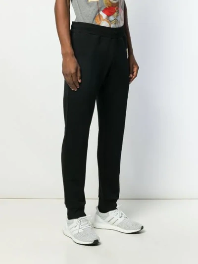 Shop Moschino Teddy Track Pants In Black