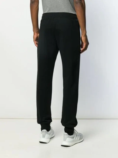 Shop Moschino Teddy Track Pants In Black